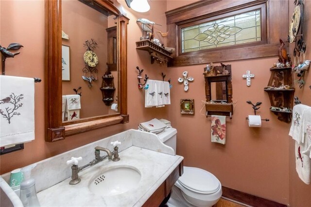 2100 River Forest Rd, Mobile, AL 36605 - half bathroom with toilet and vanity