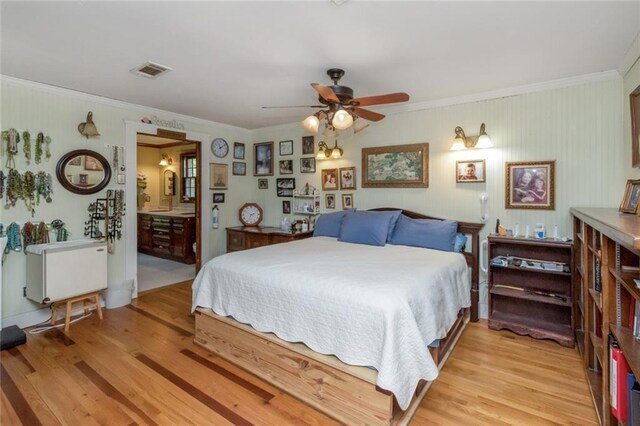 2100 River Forest Rd, Mobile, AL 36605 - bedroom featuring crown molding and light wood finished floors