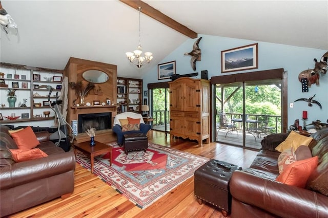 2100 River Forest Rd, Mobile, AL 36605 - living room with wood finished floors, beamed ceiling, a chandelier, a fireplace with raised hearth, and high vaulted ceiling