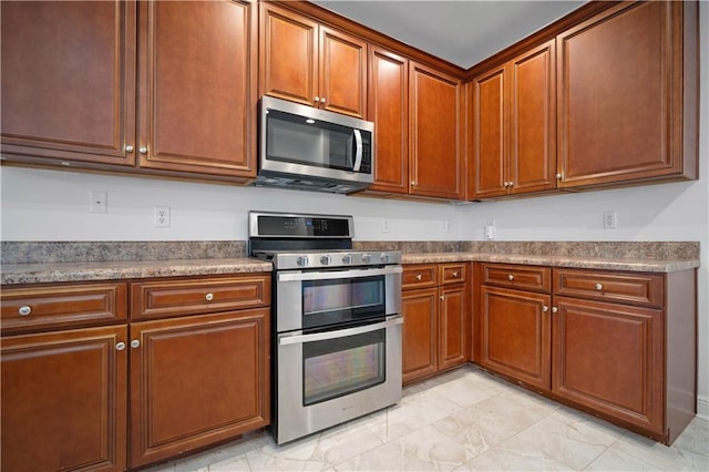 kitchen with appliances with stainless steel finishes