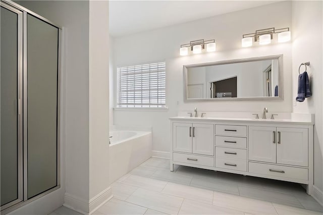 bathroom featuring vanity, independent shower and bath, and tile patterned flooring