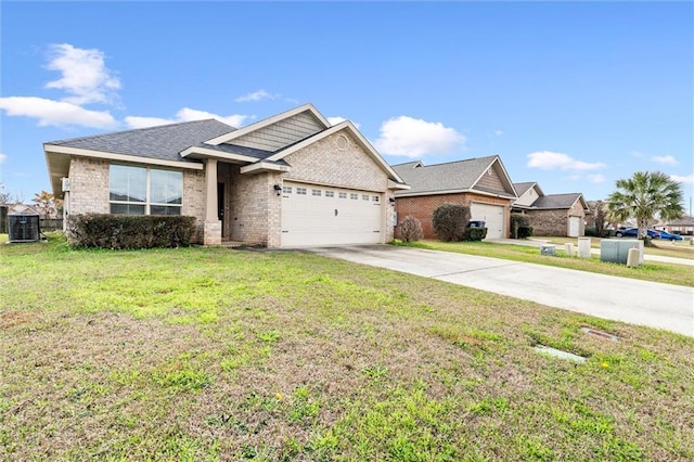 view of front of property with a garage, a front yard, and central air condition unit