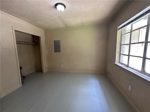1820 N Barkley Dr, Mobile, AL 36606 - unfurnished bedroom with a textured ceiling, electric panel, multiple windows, a closet, and ornamental molding
