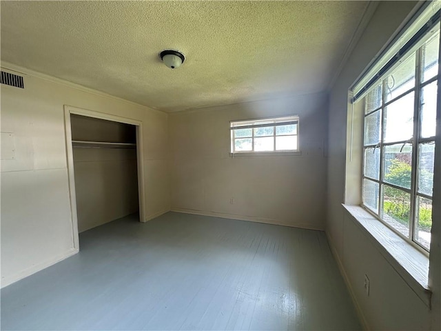 1820 N Barkley Dr, Mobile, AL 36606 - unfurnished bedroom with a textured ceiling and a closet