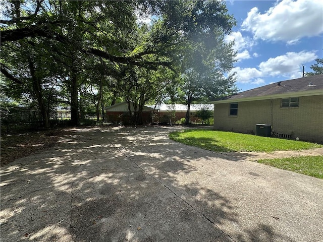 1820 N Barkley Dr, Mobile, AL 36606 - view of yard with concrete driveway