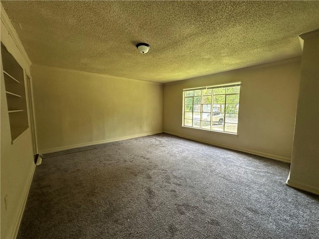 1820 N Barkley Dr, Mobile, AL 36606 - carpeted empty room with a textured ceiling and baseboards
