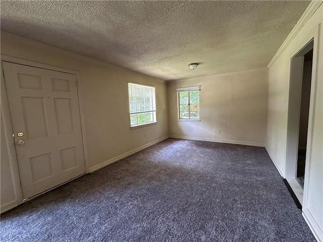 1820 N Barkley Dr, Mobile, AL 36606 - carpeted empty room with a textured ceiling and crown molding