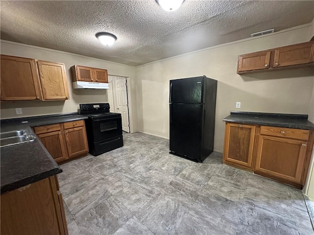 1820 N Barkley Dr, Mobile, AL 36606 - kitchen featuring black appliances, under cabinet range hood, brown cabinets, dark countertops, and a textured ceiling