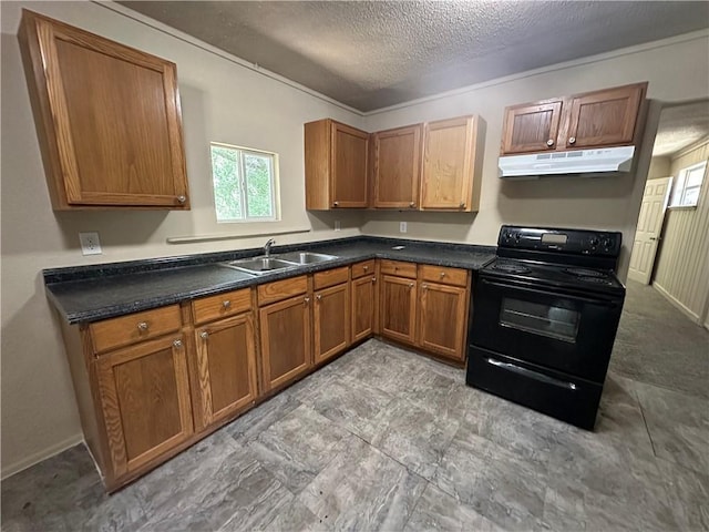 1820 N Barkley Dr, Mobile, AL 36606 - kitchen featuring electric range, under cabinet range hood, brown cabinets, a textured ceiling, and dark countertops