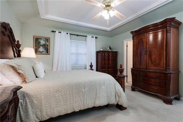 1337 Carson Rd W, Mobile, AL 36695 - bedroom with a ceiling fan, a raised ceiling, and light colored carpet