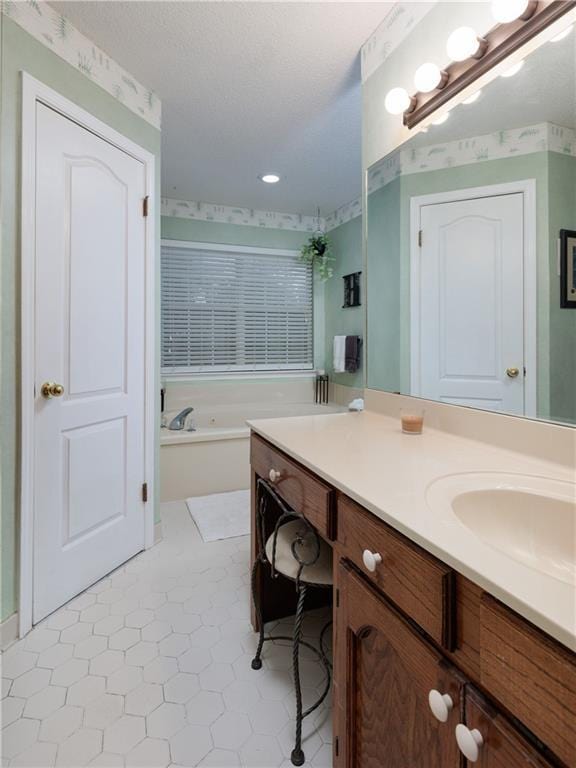 1337 Carson Rd W, Mobile, AL 36695 - bathroom with a bath, recessed lighting, and vanity