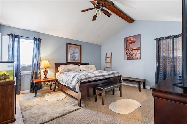 carpeted bedroom featuring vaulted ceiling with beams and ceiling fan