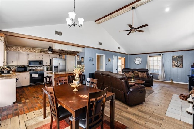 dining room featuring light hardwood / wood-style floors, high vaulted ceiling, beam ceiling, and ceiling fan with notable chandelier