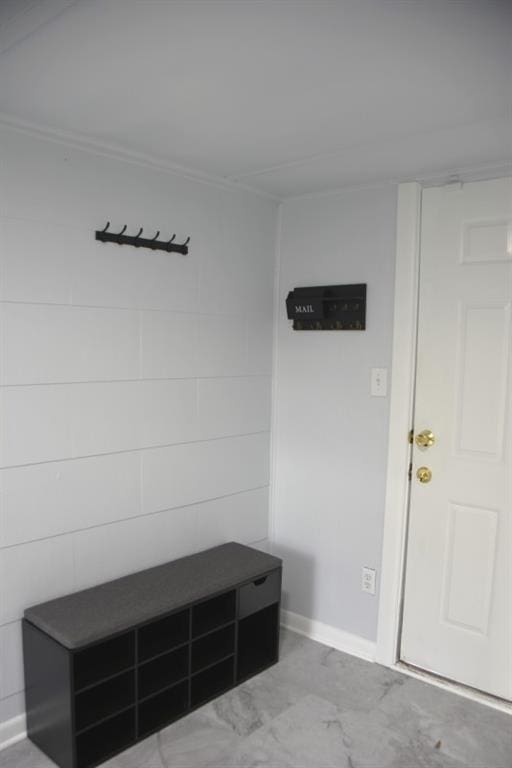 mudroom featuring baseboards and marble finish floor