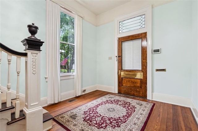 entryway featuring hardwood / wood-style flooring and a healthy amount of sunlight