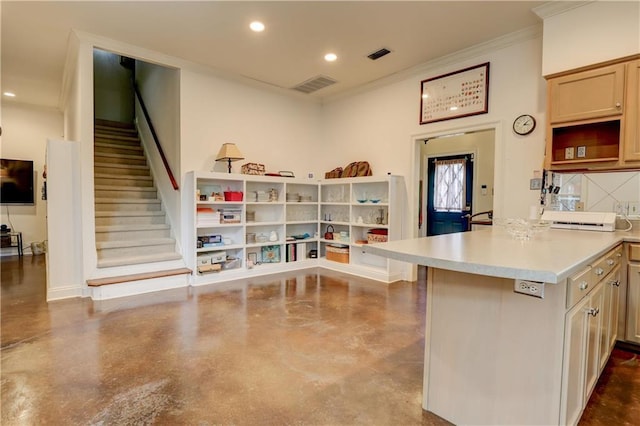 kitchen featuring crown molding, decorative backsplash, concrete floors, and light brown cabinets