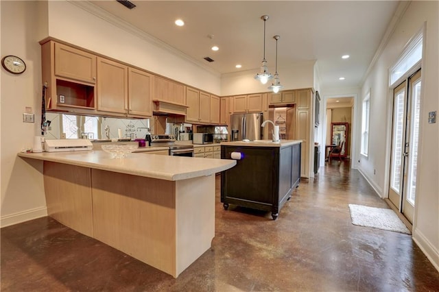 kitchen with appliances with stainless steel finishes, a peninsula, light countertops, decorative backsplash, and baseboards