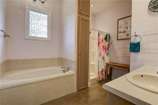 full bathroom with a garden tub, concrete floors, a stall shower, and vanity