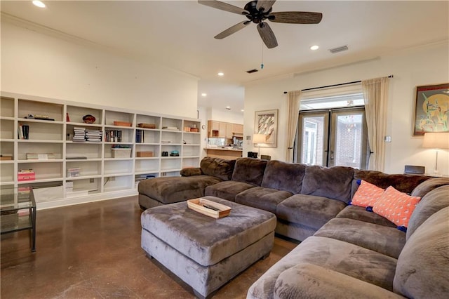 living room with ornamental molding, french doors, and ceiling fan