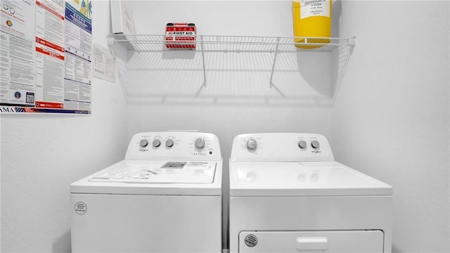 laundry area featuring washing machine and dryer