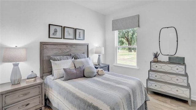 bedroom with light wood-type flooring