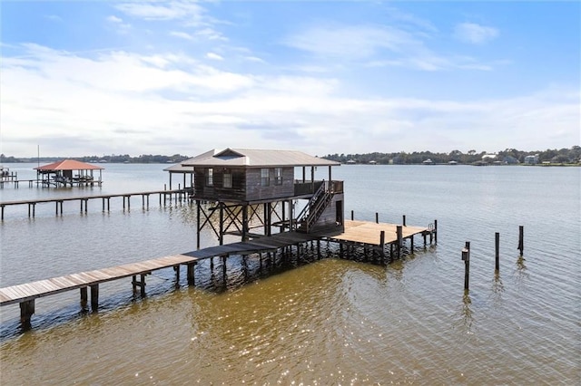 dock area with a water view