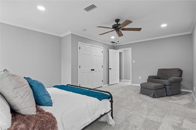 carpeted bedroom with ceiling fan and crown molding