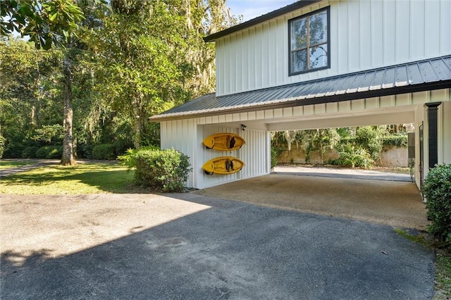 garage featuring a carport