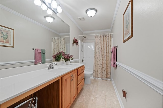 bathroom featuring tile patterned flooring, toilet, ornamental molding, and vanity