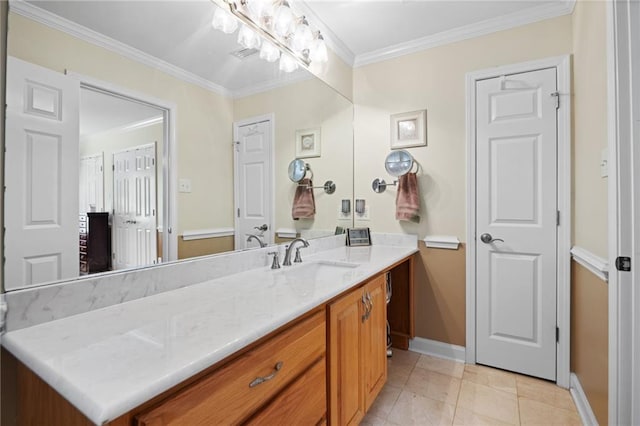 bathroom featuring crown molding, vanity, and tile patterned floors