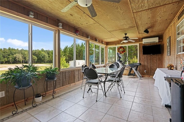 sunroom / solarium featuring ceiling fan, an AC wall unit, and wooden ceiling