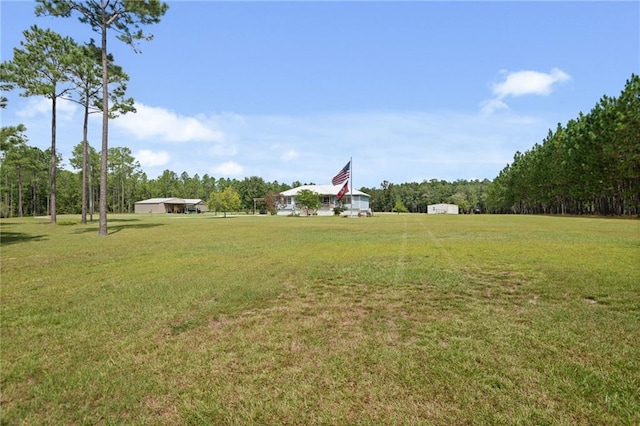 exterior space with a yard