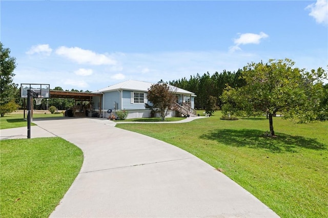 exterior space with a front yard and a carport