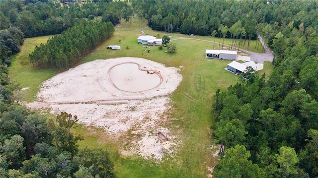 birds eye view of property with a rural view