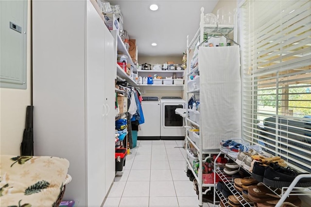 storage room with independent washer and dryer