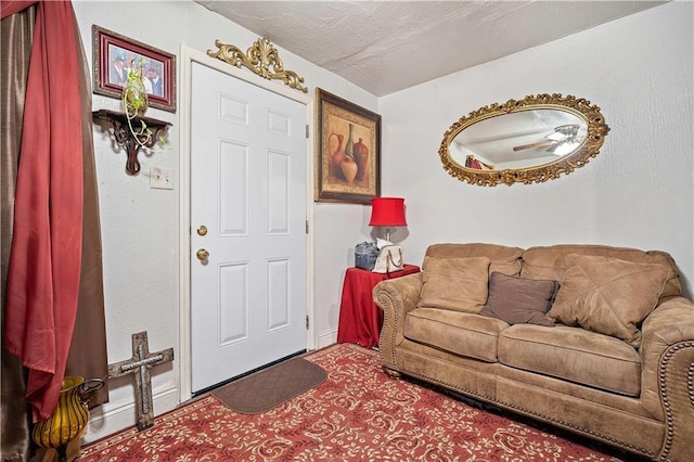 living room featuring a textured ceiling