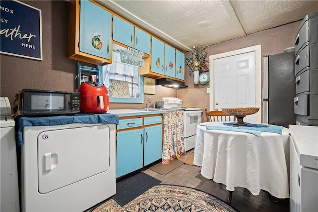 washroom with washer / dryer and sink