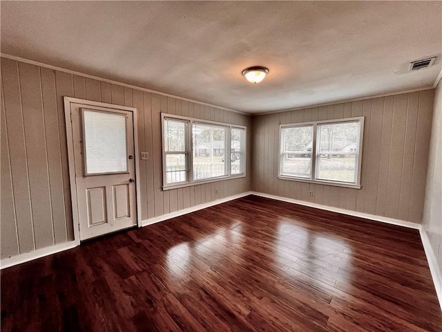 entrance foyer featuring dark hardwood / wood-style flooring