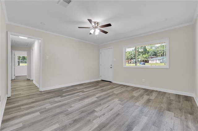 355 La Rose Dr, Mobile, AL 36609 - empty room with wood finished floors, a ceiling fan, baseboards, ornamental molding, and attic access
