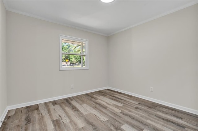 355 La Rose Dr, Mobile, AL 36609 - unfurnished room featuring wood finished floors, baseboards, and crown molding