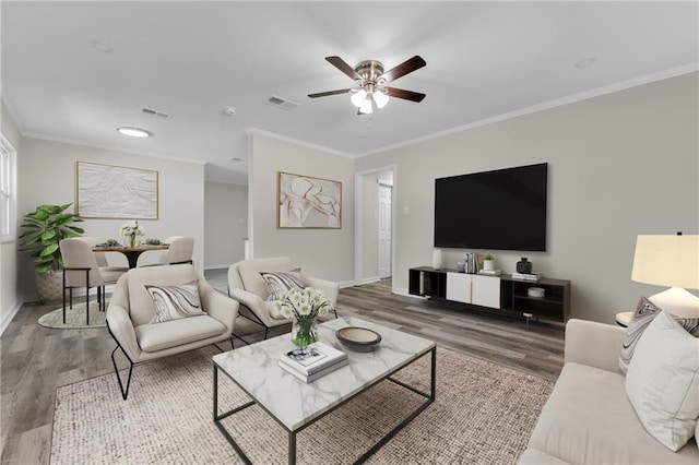 355 La Rose Dr, Mobile, AL 36609 - living area featuring wood finished floors, ceiling fan, crown molding, and baseboards