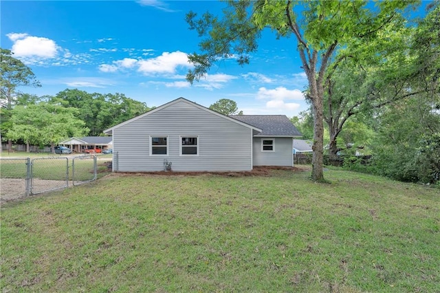 355 La Rose Dr, Mobile, AL 36609 - rear view of house with a gate