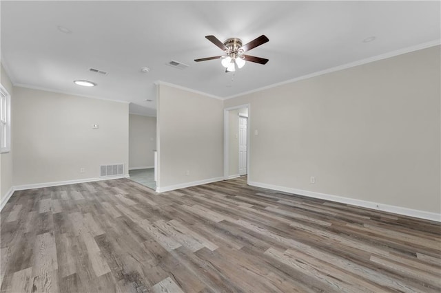 355 La Rose Dr, Mobile, AL 36609 - unfurnished room with ceiling fan, crown molding, wood finished floors, and baseboards