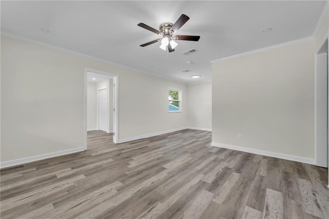 355 La Rose Dr, Mobile, AL 36609 - spare room featuring crown molding, wood finished floors, ceiling fan, and baseboards