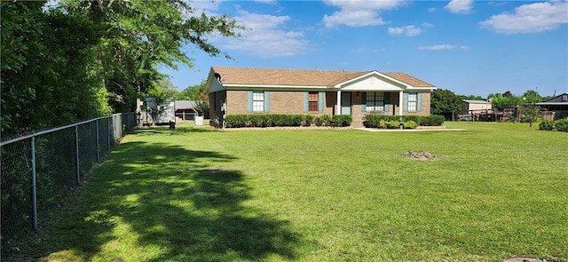 view of front of property with a front lawn