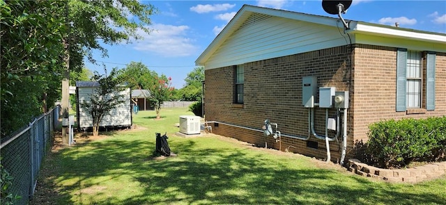 view of home's exterior with a lawn