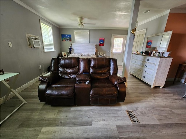 8560 Sadie Ct, Grand Bay, AL 36541 - living room featuring an AC wall unit, crown molding, wood finished floors, and ceiling fan