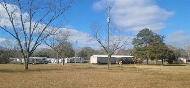 view of yard featuring a detached carport