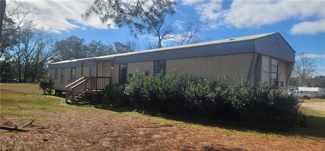 view of home's exterior featuring a yard