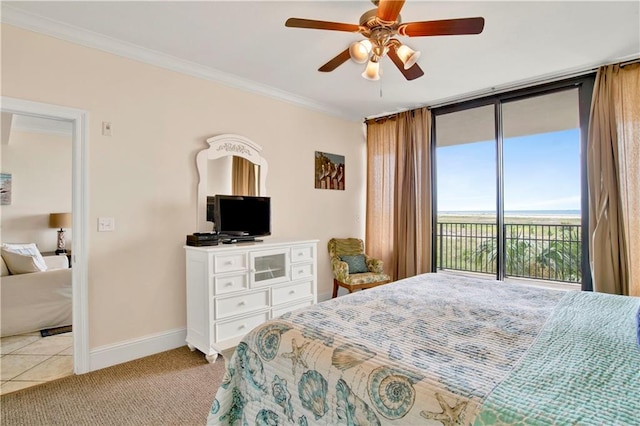 carpeted bedroom featuring crown molding, access to exterior, and ceiling fan